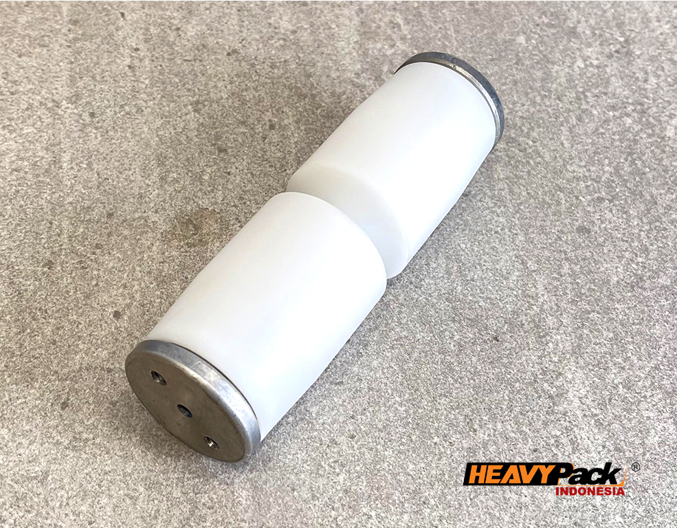 menggerakkan dan menopang belt conveyor agar kemasan bisa berjalan mulus menuju area sealing, menjaga ketegangan belt, serta memastikan pergerakan kemasan stabil dan tidak tersendat.